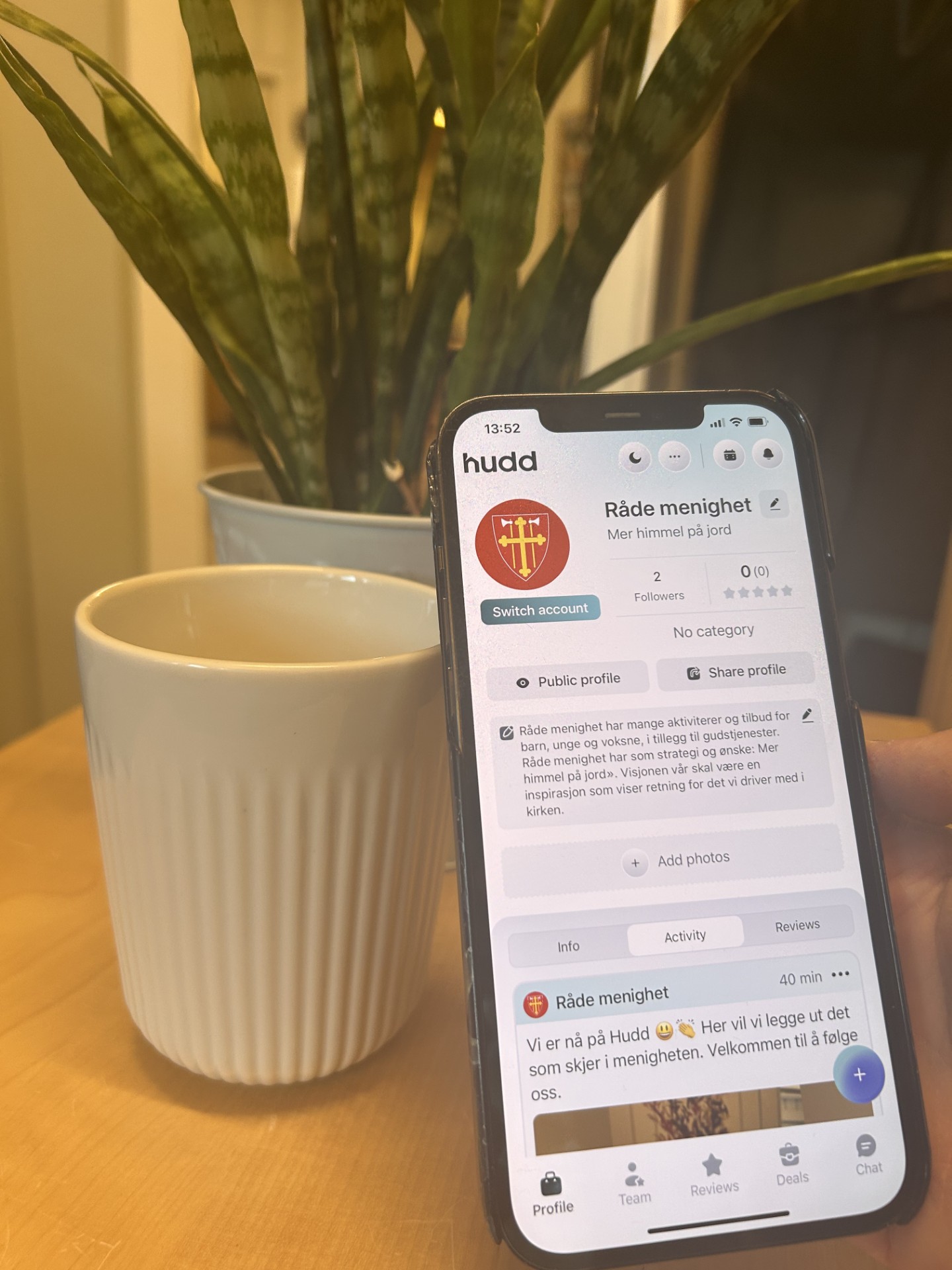 Bilde av mobiltelefon logget inn på Hudd for Råde menighet